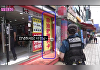 서울 한복판서 중국어로 '불법여권개통' 문구⋯손님은 경찰복 입은 걸그룹 보고 줄행랑